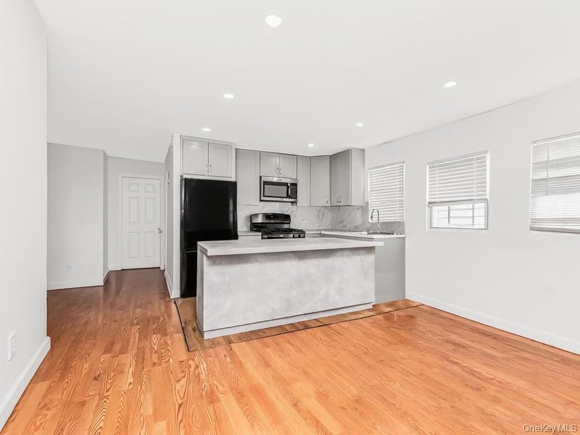 Rare 2-family semi-detached home located in the desirable - photo 3