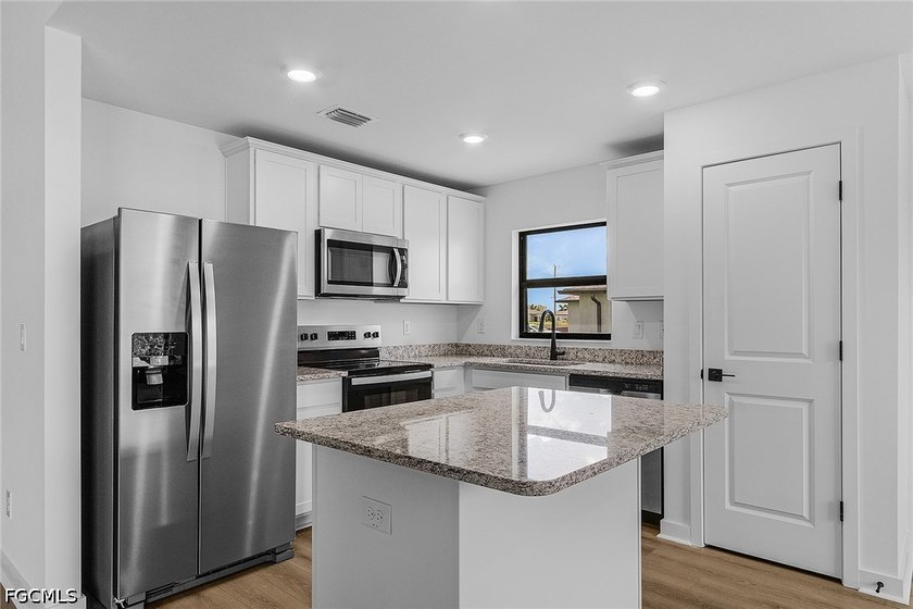 TRIPLE LOT! Home is pre-construction and the expected completion - photo 2