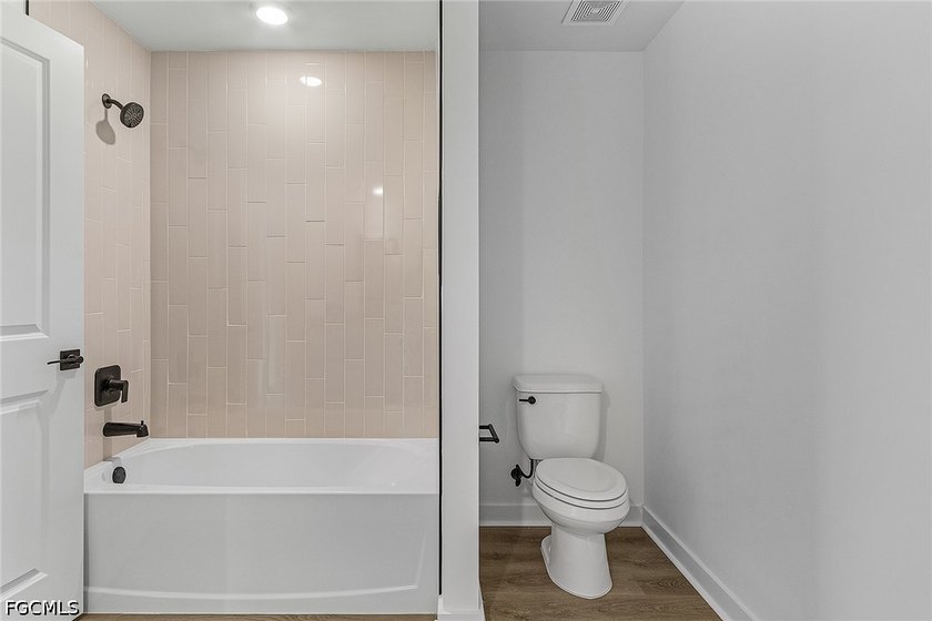 TRIPLE LOT! Home is pre-construction and the expected completion - photo 6