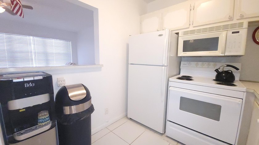 REDUCED TO SELL! Discover easy coastal living in this charming - photo 8