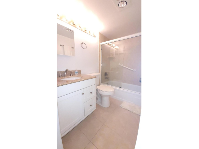 REDUCED TO SELL! Discover easy coastal living in this charming - photo 9