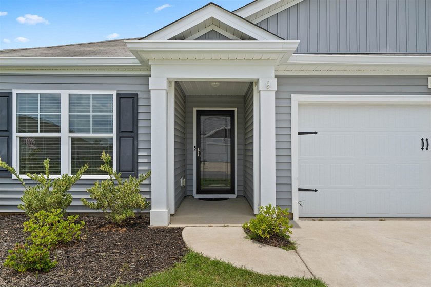 Welcome to this beautifully maintained 3-bedroom, 2-bath home in - photo 3