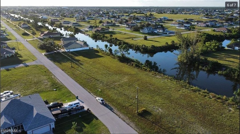Discover the perfect intersection canal-front lot with expansive - photo 3