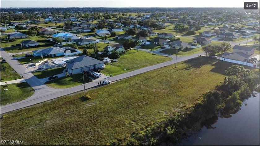 Discover the perfect intersection canal-front lot with expansive - photo 4