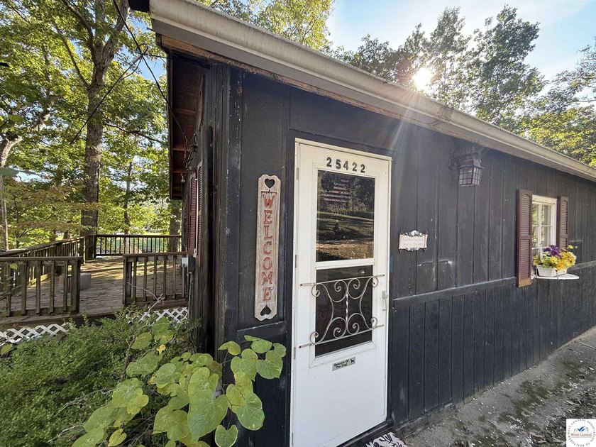 Discover the potential of this quaint two-bedroom cabin, nestled - photo 11