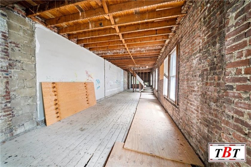 Welcome to 1073 East 3rd Street, a one family brick home sitting - photo 12