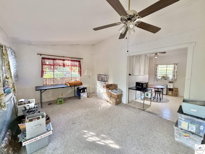 Discover the potential of this quaint two-bedroom cabin, nestled - photo 13