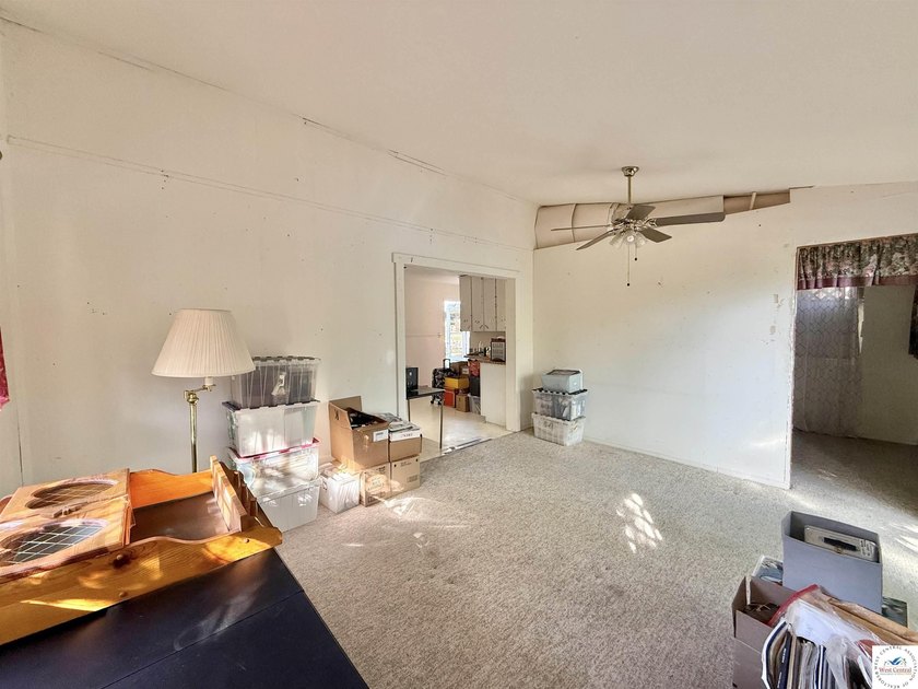 Discover the potential of this quaint two-bedroom cabin, nestled - photo 14