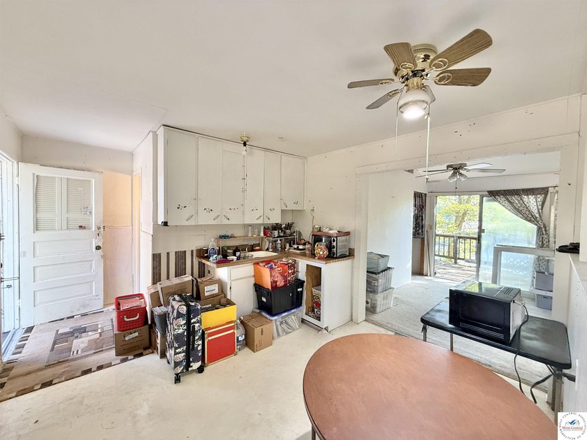 Discover the potential of this quaint two-bedroom cabin, nestled - photo 16