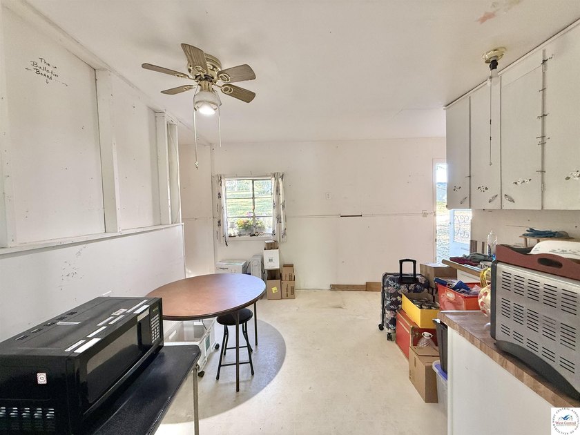 Discover the potential of this quaint two-bedroom cabin, nestled - photo 17