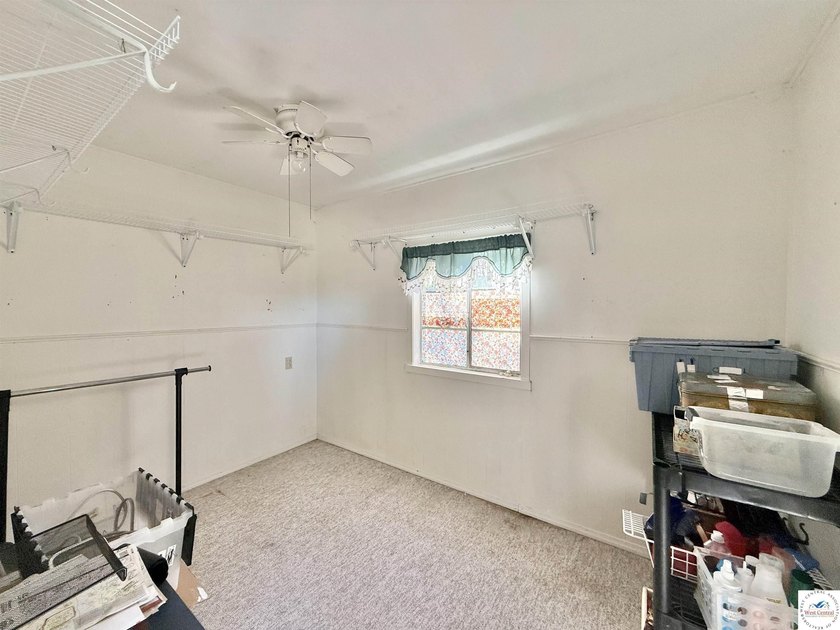 Discover the potential of this quaint two-bedroom cabin, nestled - photo 18