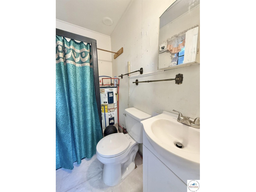 Discover the potential of this quaint two-bedroom cabin, nestled - photo 20