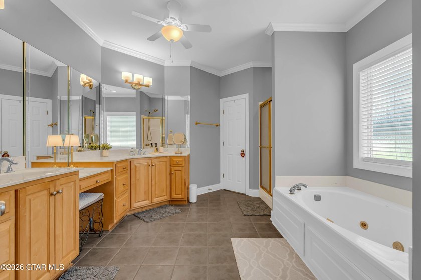 Nestled on approximately 1.5 beautifully landscaped acres in the - photo 24