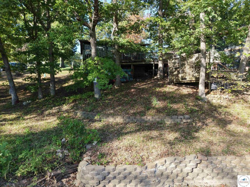 Discover the potential of this quaint two-bedroom cabin, nestled - photo 26