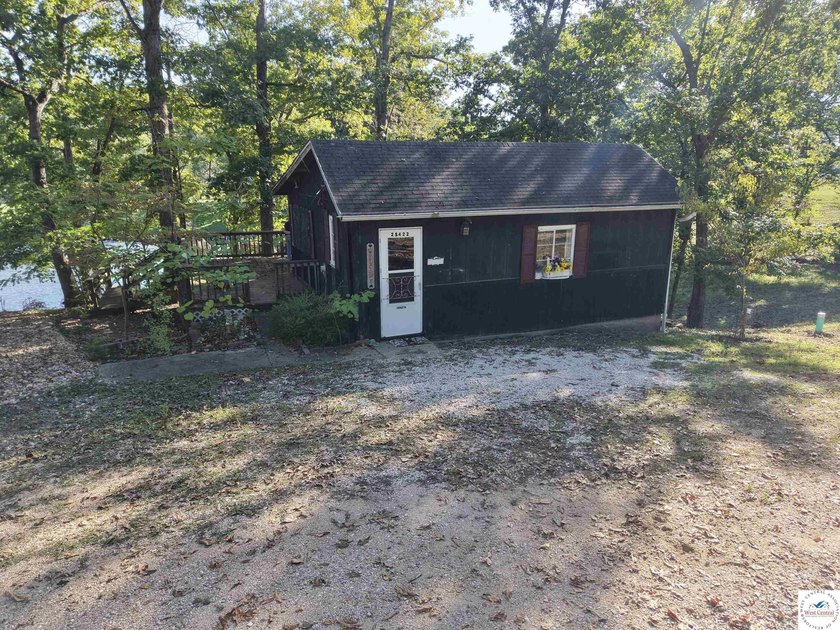 Discover the potential of this quaint two-bedroom cabin, nestled - photo 28