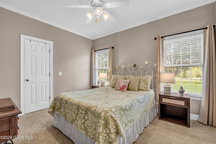 Nestled on approximately 1.5 beautifully landscaped acres in the - photo 30