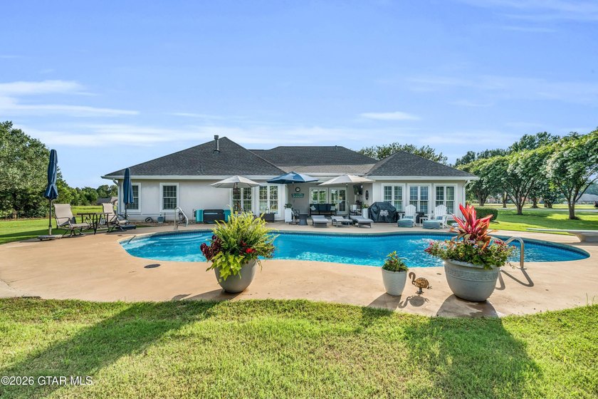 Nestled on approximately 1.5 beautifully landscaped acres in the - photo 40