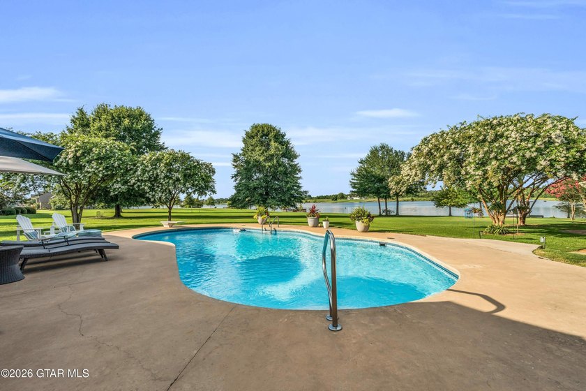 Nestled on approximately 1.5 beautifully landscaped acres in the - photo 42