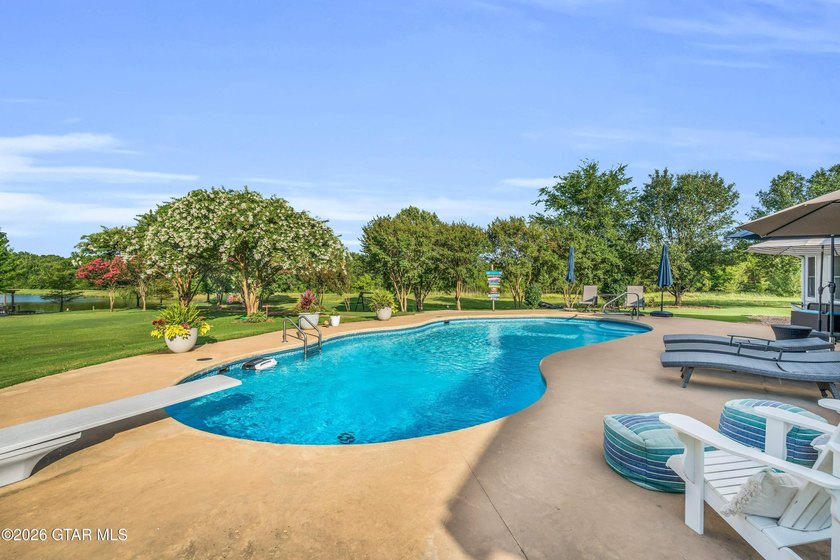 Nestled on approximately 1.5 beautifully landscaped acres in the - photo 43