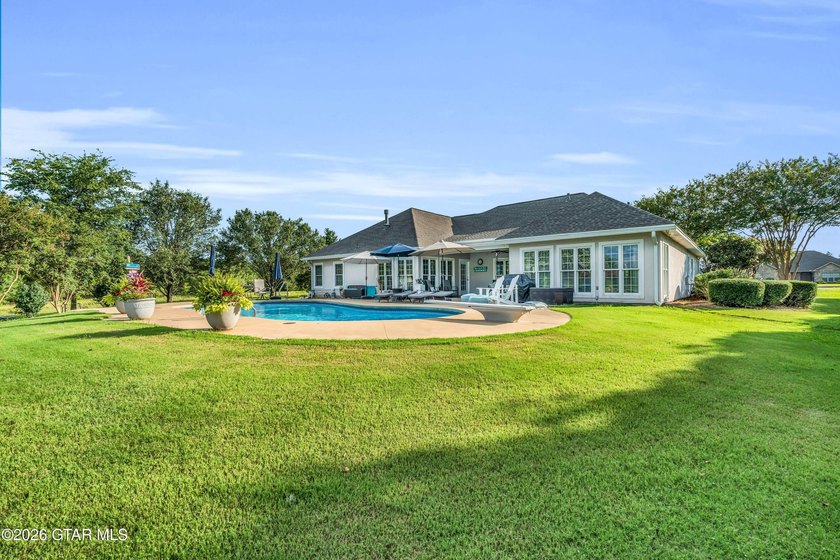 Nestled on approximately 1.5 beautifully landscaped acres in the - photo 44
