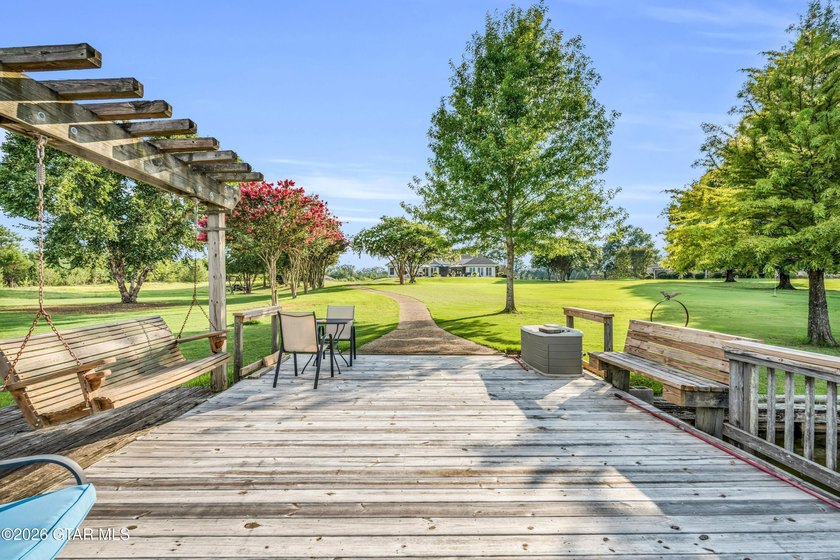 Nestled on approximately 1.5 beautifully landscaped acres in the - photo 47