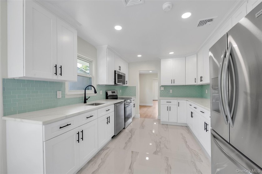 Welcome to this fully renovated Hi Ranch House in the Heart of - photo 7