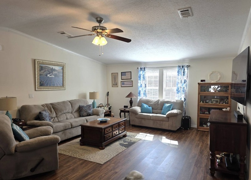 THIS HOME IS ON LEASED LAND WITH A MONTHLY LOT OF $545 AND THAT - photo 3