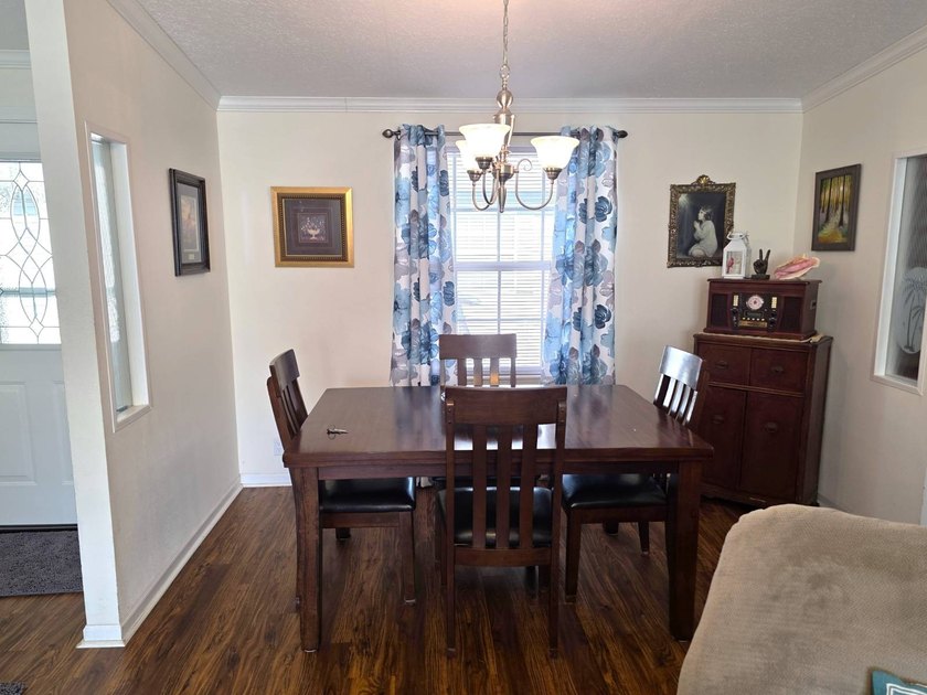 THIS HOME IS ON LEASED LAND WITH A MONTHLY LOT OF $545 AND THAT - photo 5