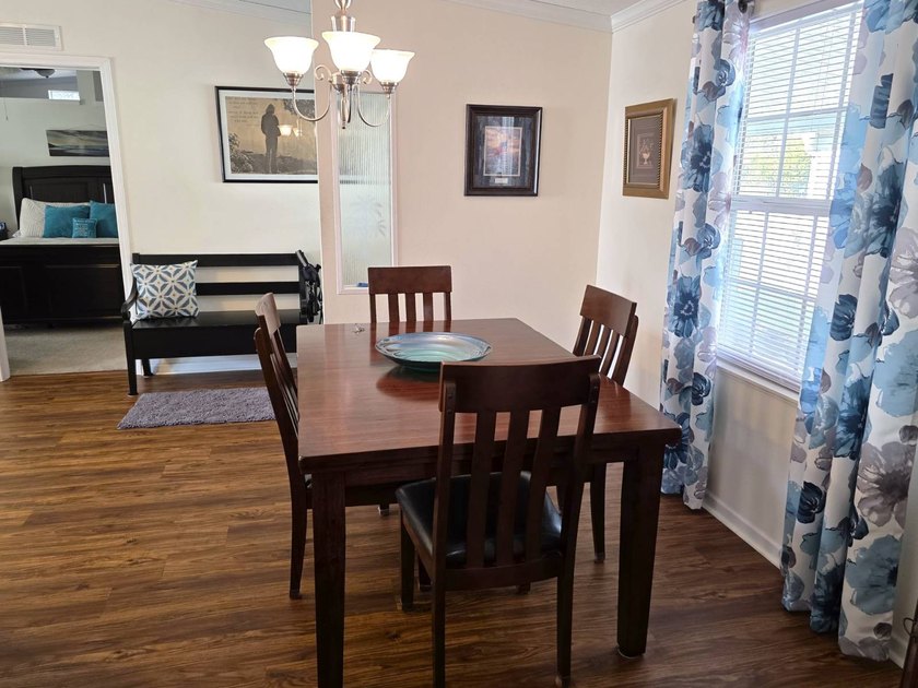 THIS HOME IS ON LEASED LAND WITH A MONTHLY LOT OF $545 AND THAT - photo 6