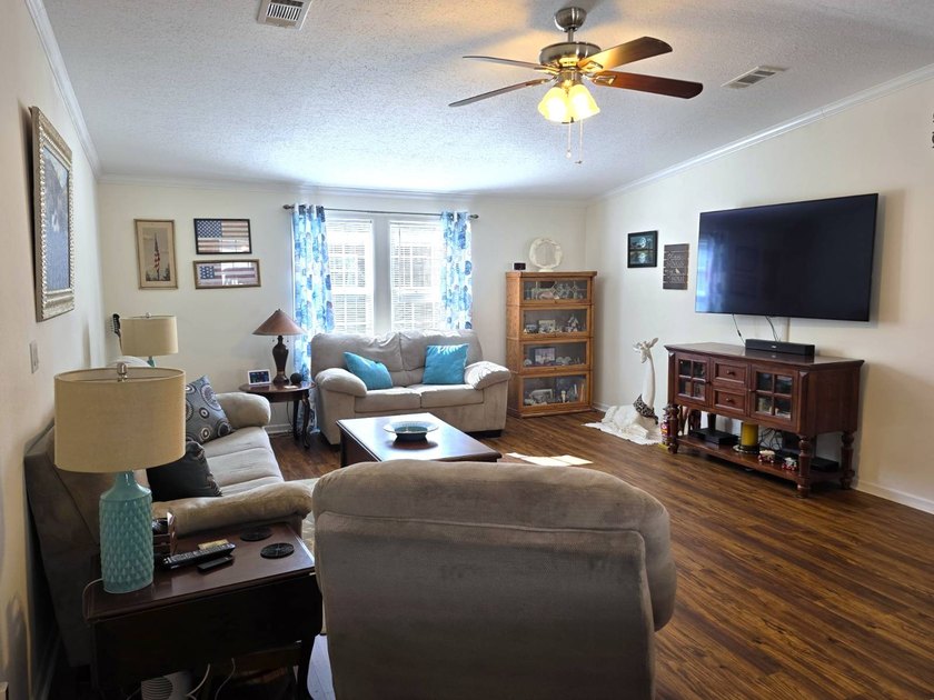 THIS HOME IS ON LEASED LAND WITH A MONTHLY LOT OF $545 AND THAT - photo 9