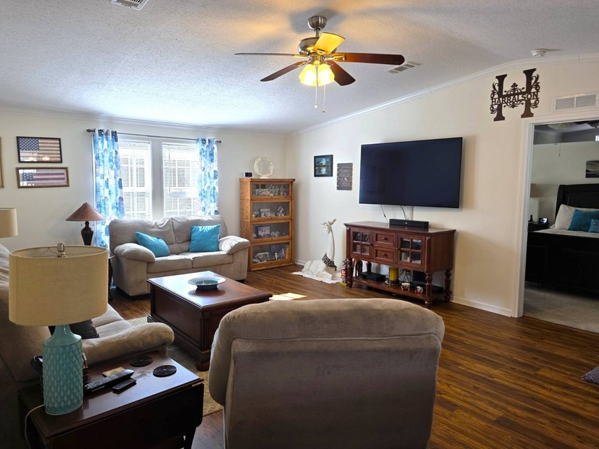 THIS HOME IS ON LEASED LAND WITH A MONTHLY LOT OF $545 AND THAT - photo 10