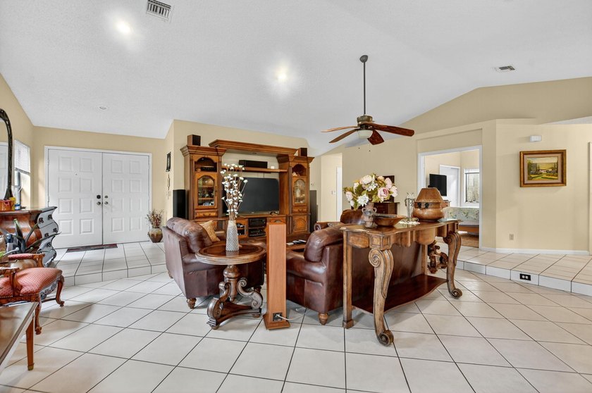 This wonderfully designed single-story home features a highly - photo 7