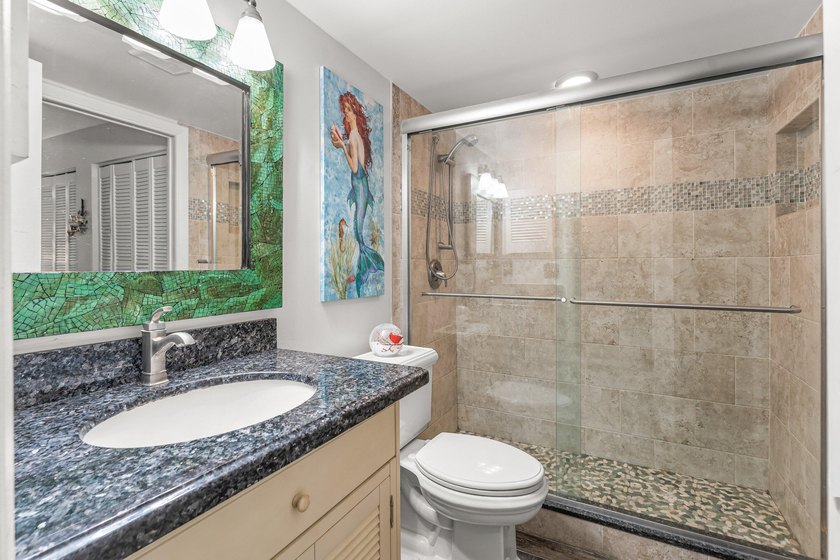 Beautifully updated waterfront 1-bedroom, 1-bath residence in - photo 15