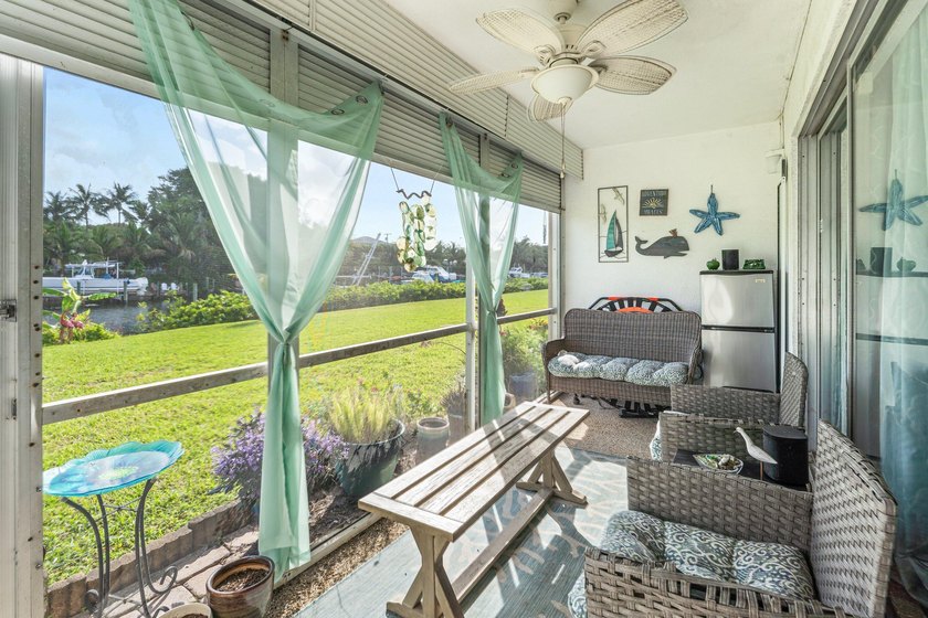 Beautifully updated waterfront 1-bedroom, 1-bath residence in - photo 16