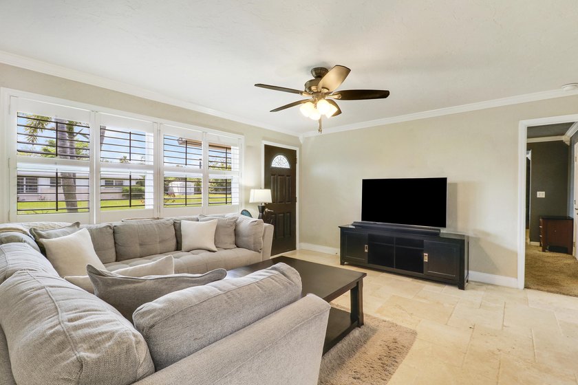 Welcome to 19049 SE Robert Drive. This charming Jupiter home - photo 5