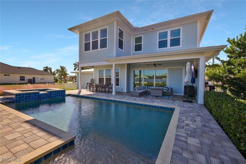 MAJOR PRICE REDUCTION! RELAXING POOLSIDE IN PARADISE! Discover - photo 6