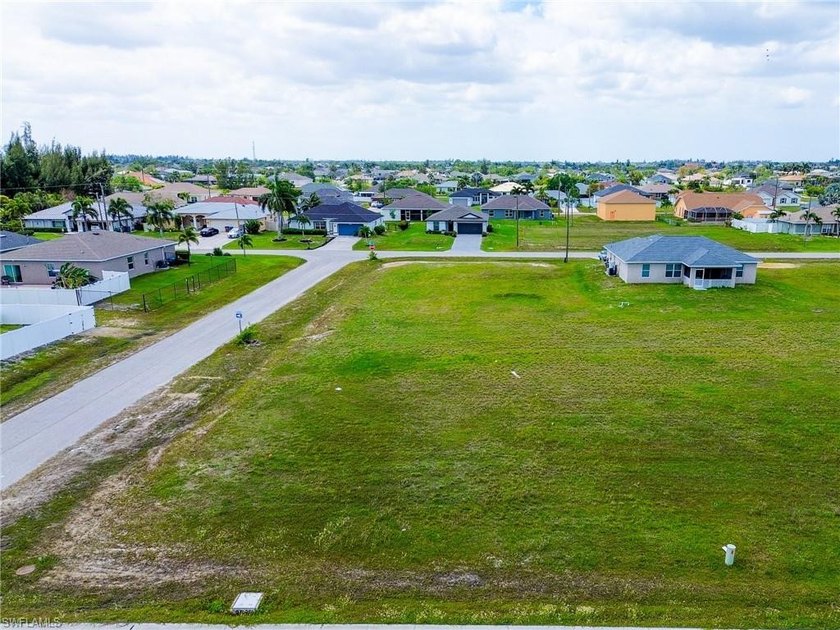 Build your dream home on this cleared vacant lot in the rapidly - photo 3