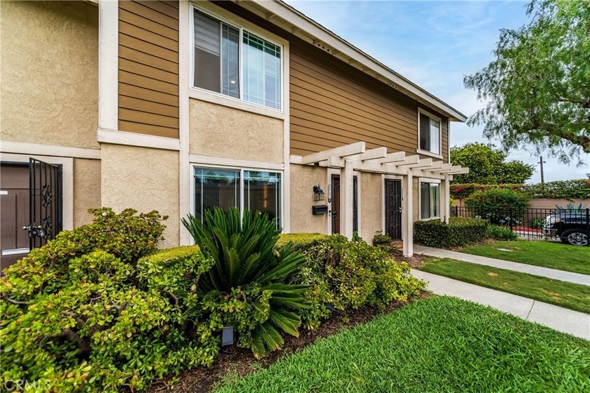 Welcome to this beautifully updated two-story townhome located - photo 2