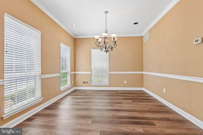 Experience low-maintenance luxury living in this beautifully - photo 10