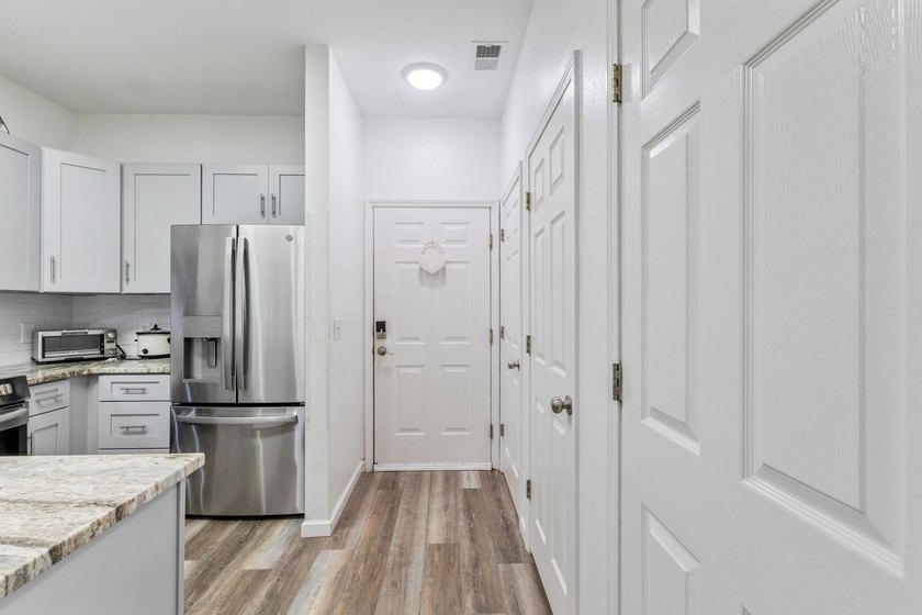 Discover this beautifully renovated first-floor end-unit condo - photo 2