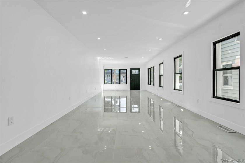Welcome to 1050 East 31st Street, a beautifully renovated - photo 3