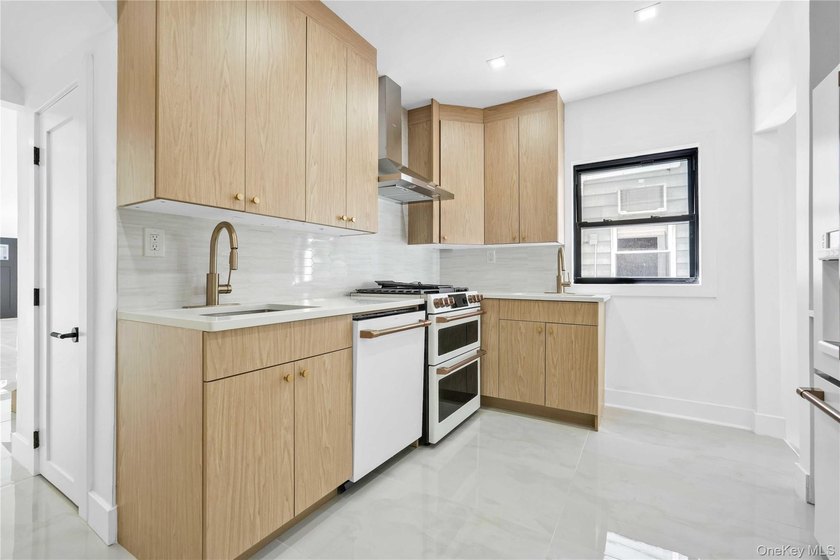 Welcome to 1050 East 31st Street, a beautifully renovated - photo 8