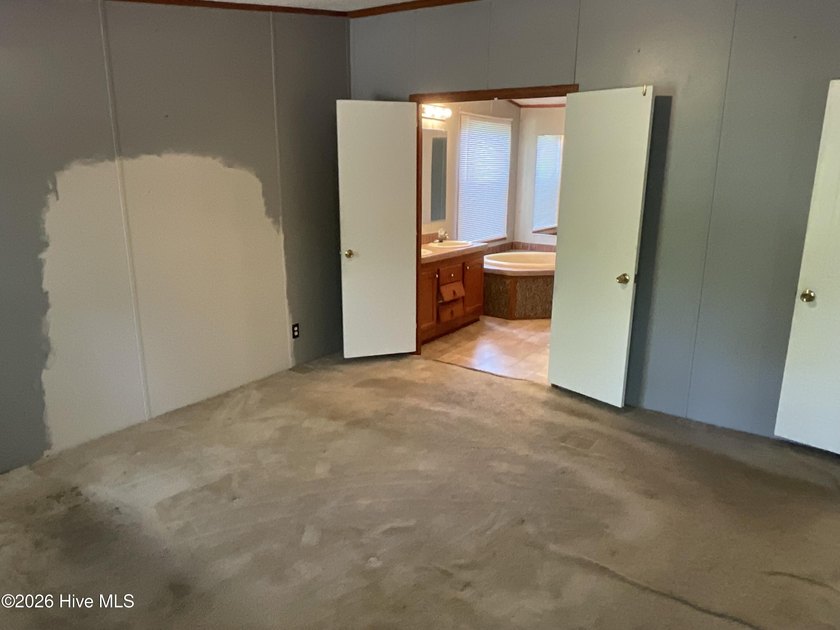 Tucked away on a generous 0.46-acre lot, this spacious 4-bedroom - photo 11