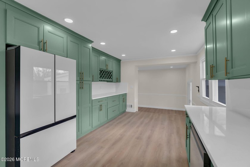 Welcome home to this beautifully remodeled ranch where modern - photo 14