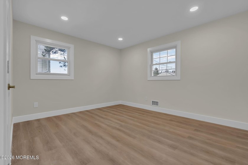 Welcome home to this beautifully remodeled ranch where modern - photo 22
