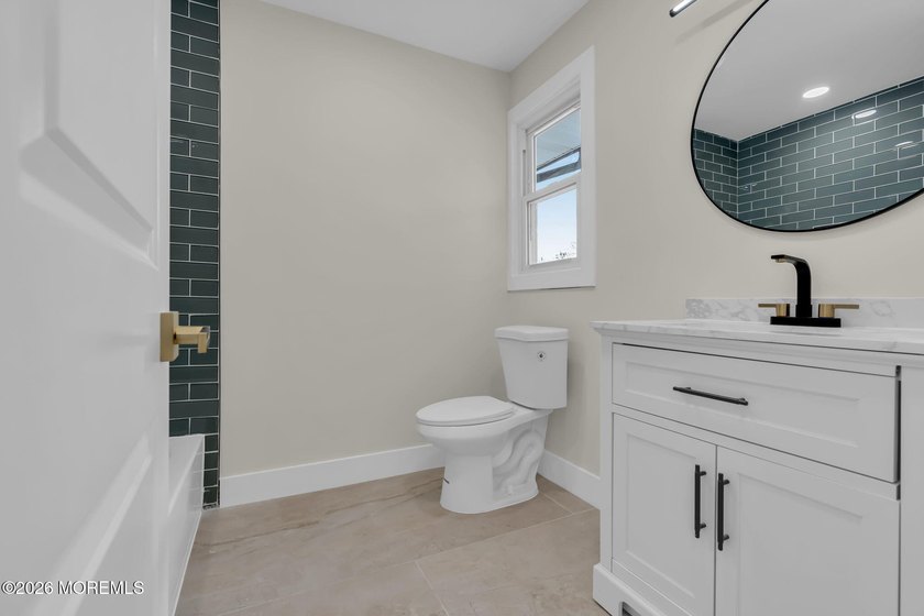 Welcome home to this beautifully remodeled ranch where modern - photo 25