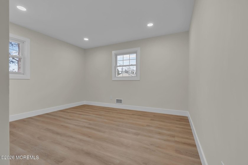 Welcome home to this beautifully remodeled ranch where modern - photo 29
