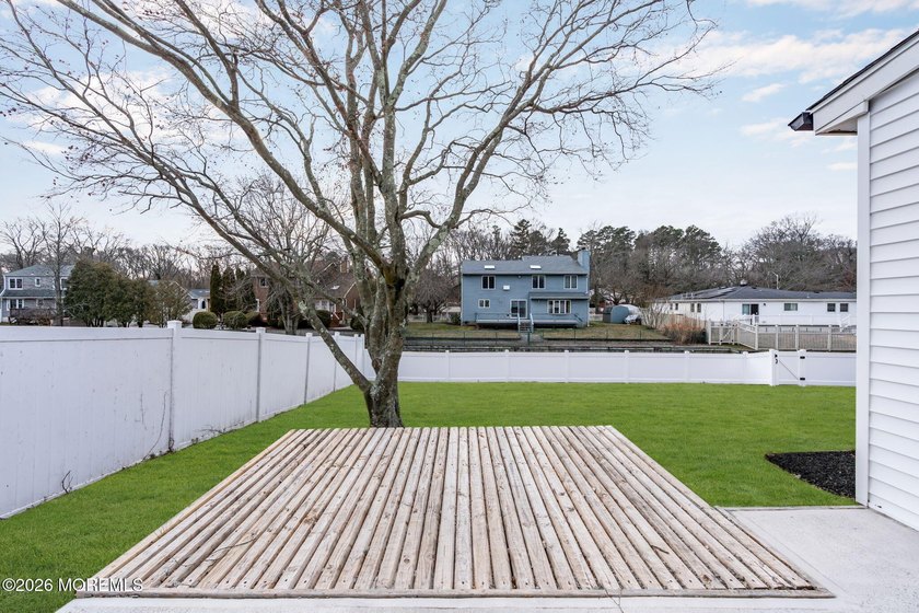 Welcome home to this beautifully remodeled ranch where modern - photo 40