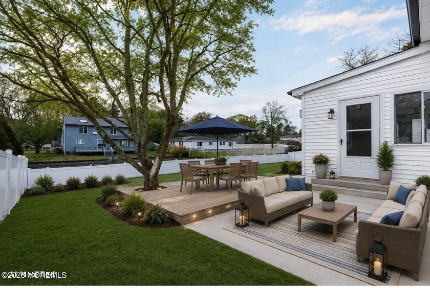 Welcome home to this beautifully remodeled ranch where modern - photo 41