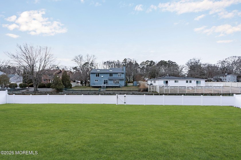 Welcome home to this beautifully remodeled ranch where modern - photo 43